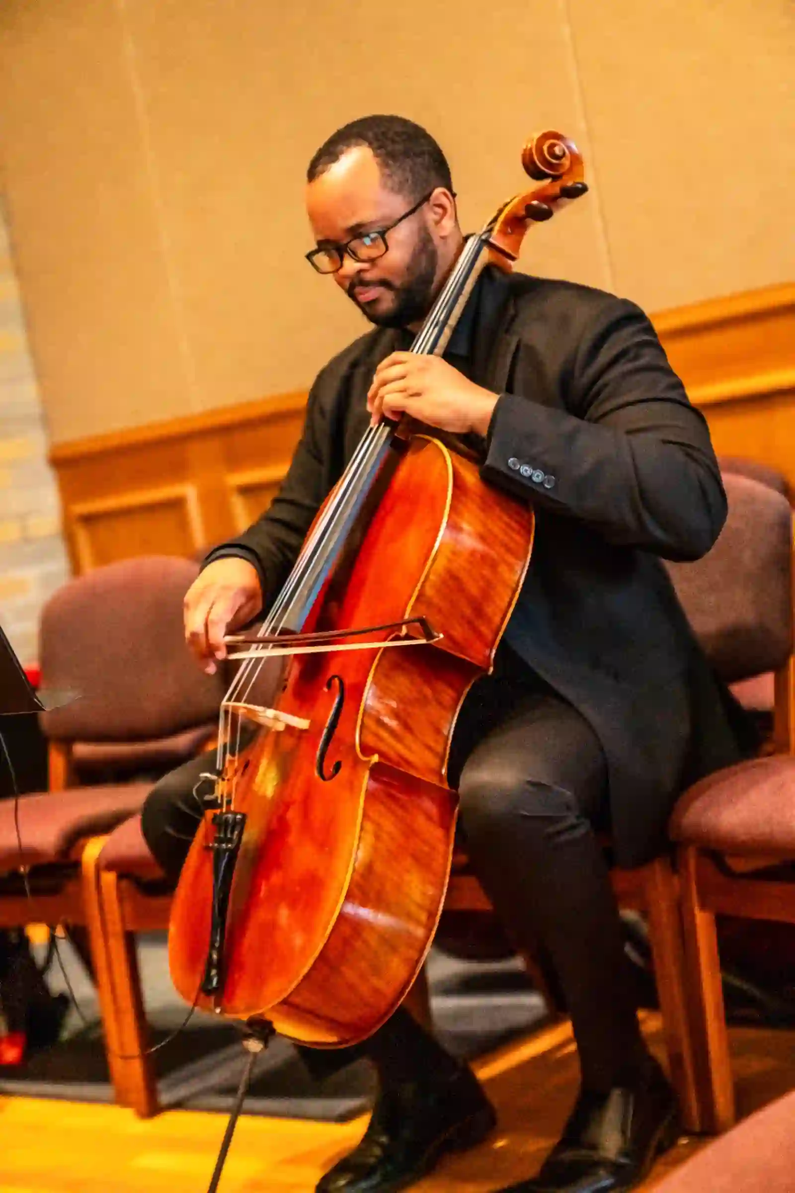 Cellist performing during the church ceremony