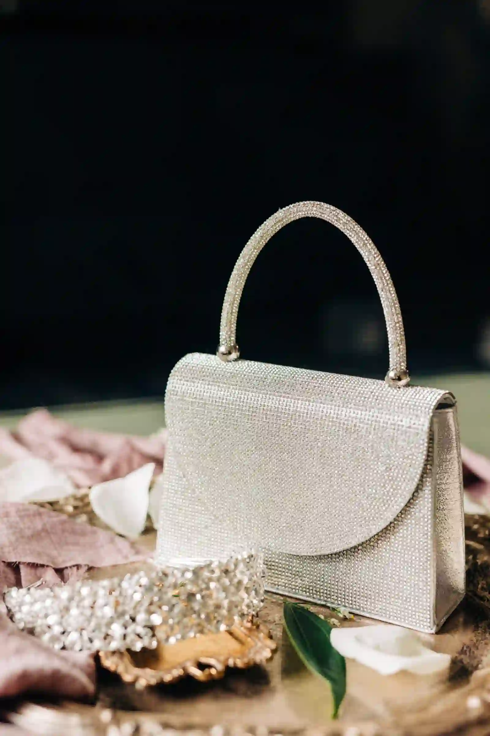 Crystal bridal bag styled with floral details