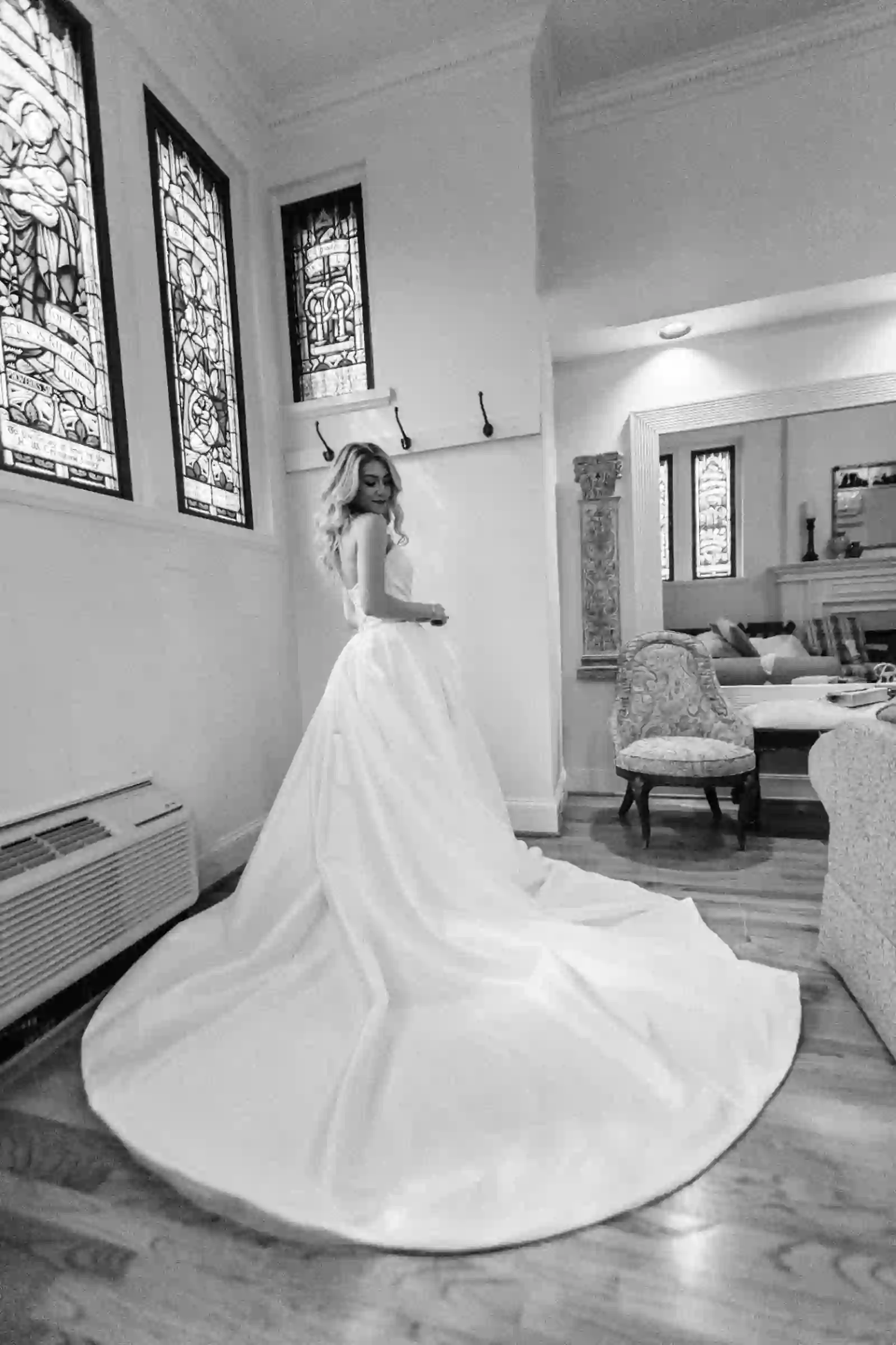 Black-and-white portrait of the bride in her gown
