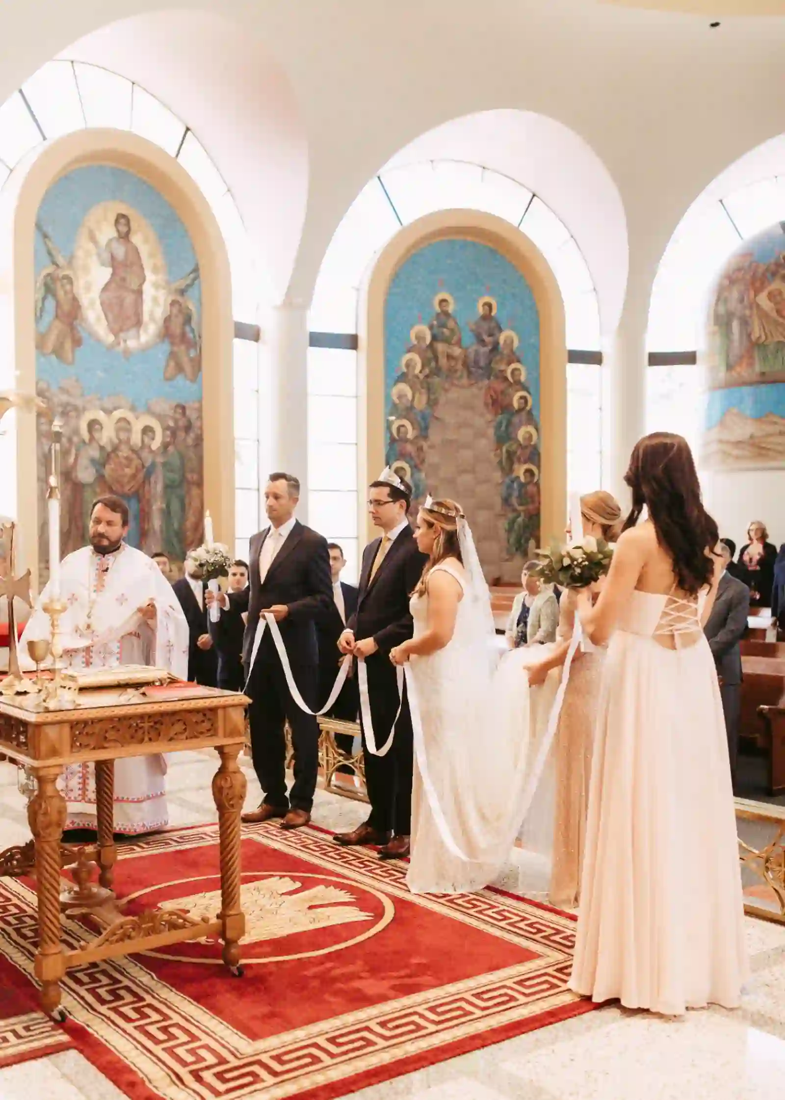 Orthodox ceremony with crowns and ribbon