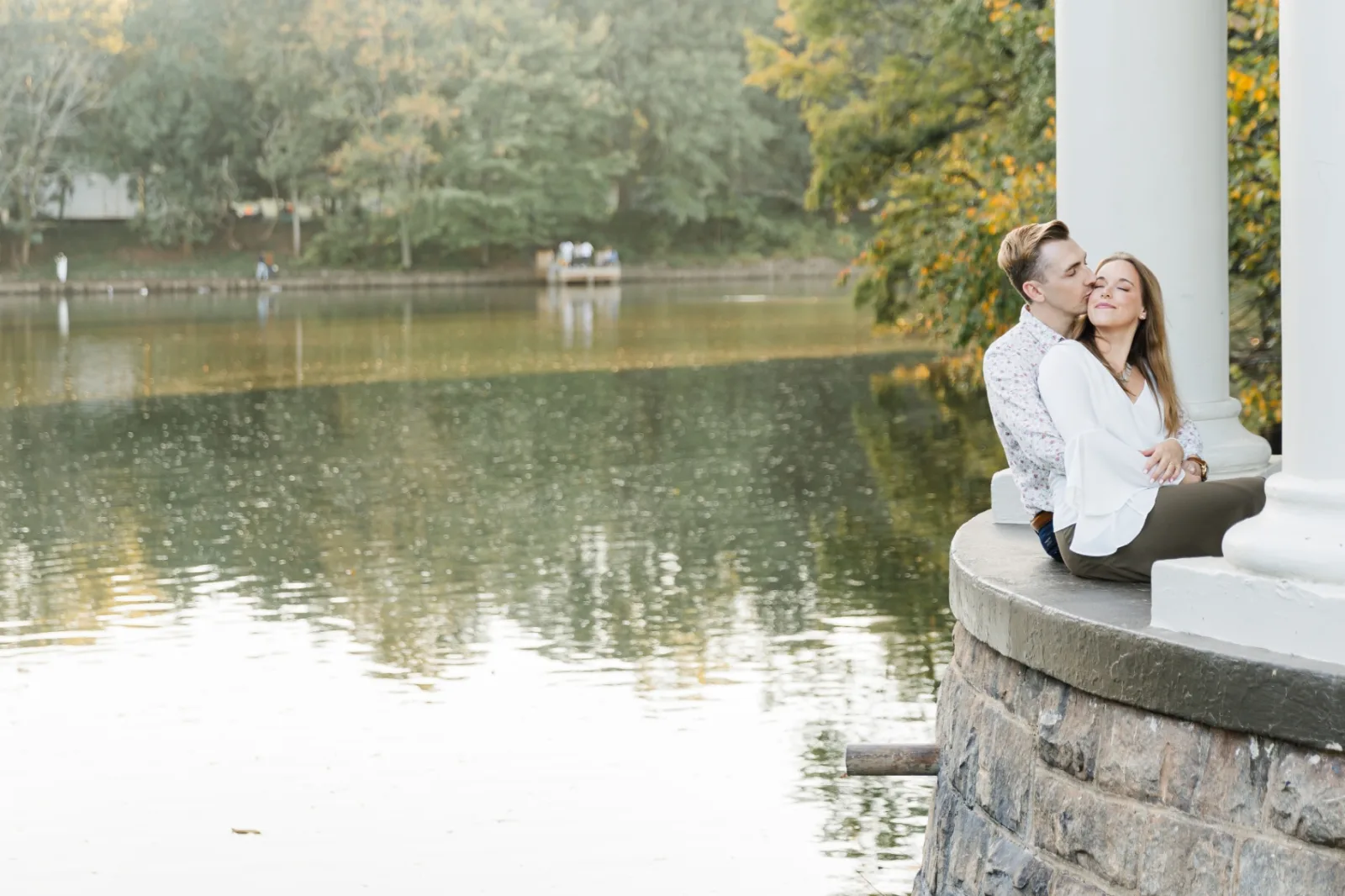 Engagement portrait by the lake at Piedmont Park