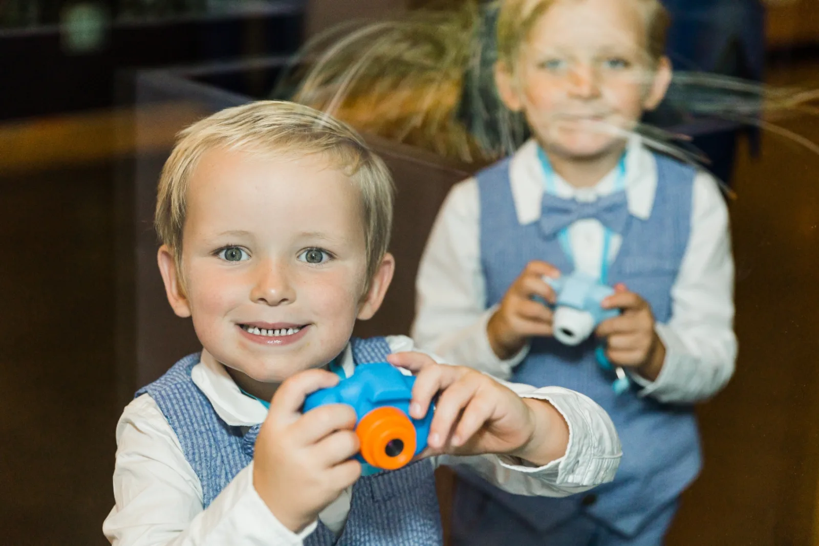 Ring bearers with toy cameras
