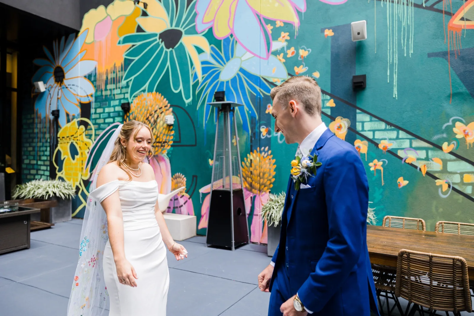 First look against floral mural