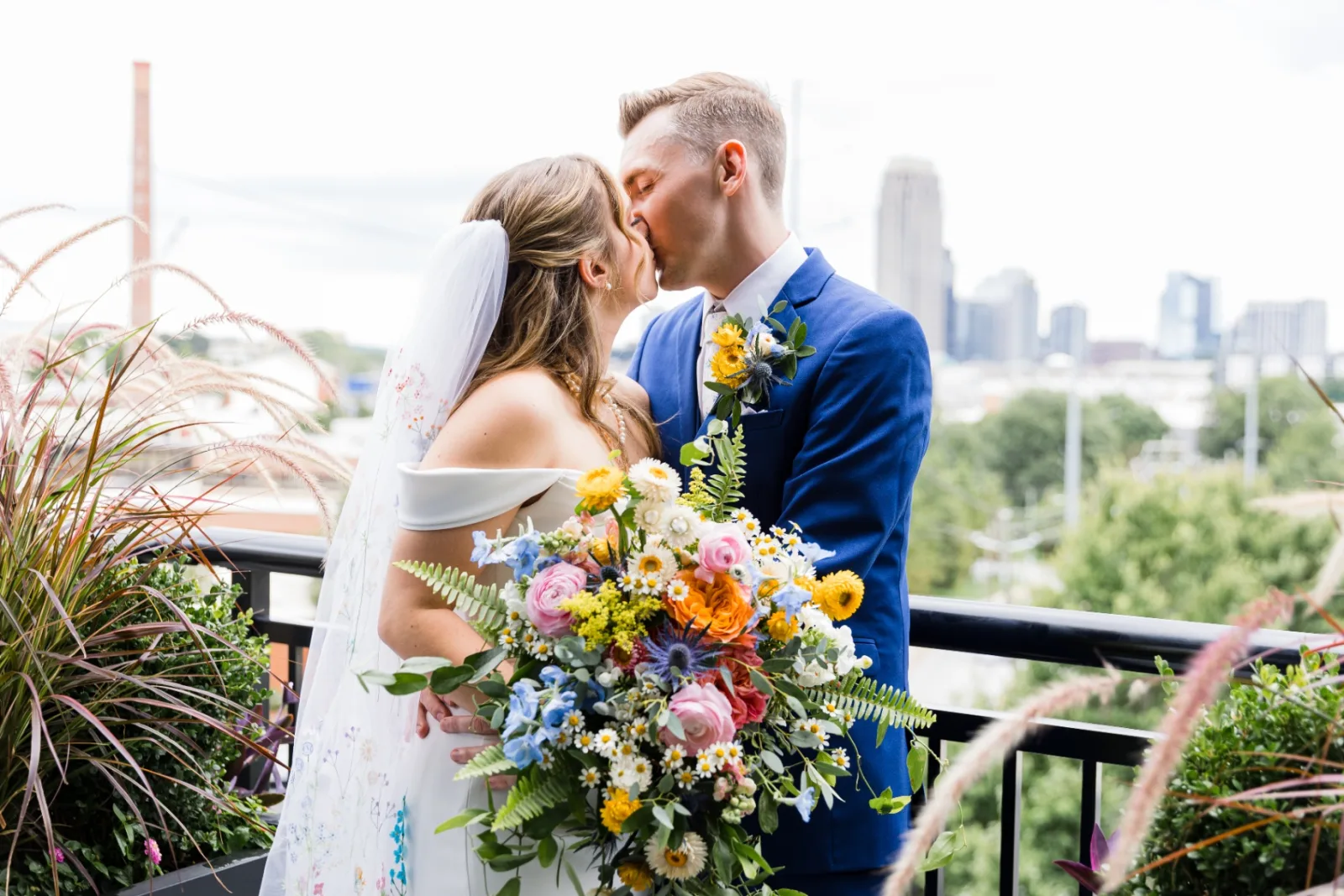 Rooftop kiss with Atlanta skyline