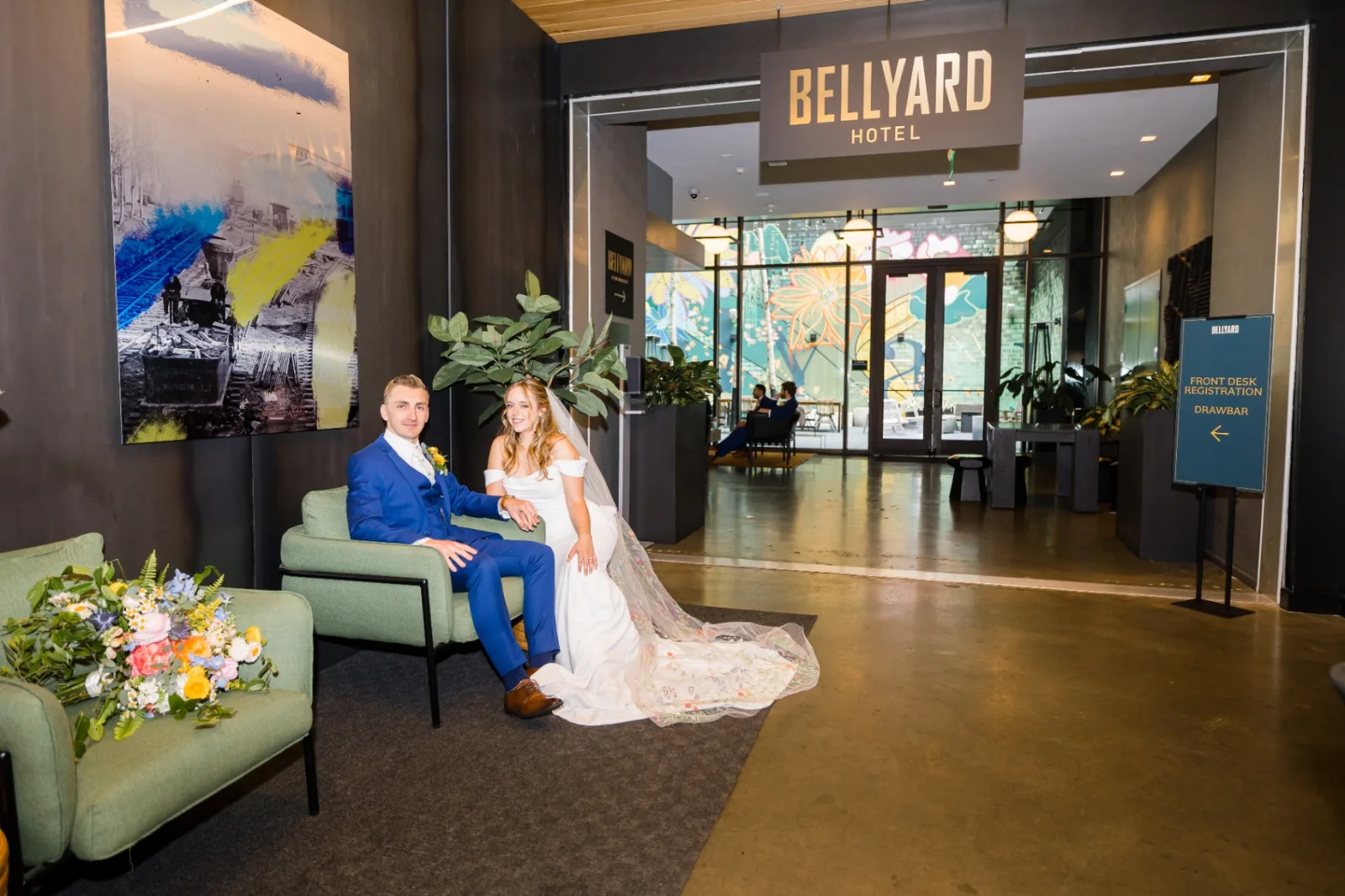 Newlyweds at the Bellyard Hotel lobby