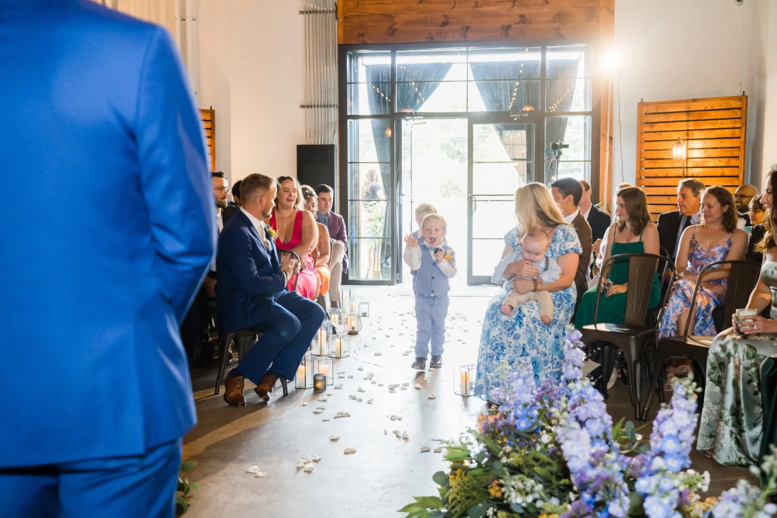 Ring bearer walking down the aisle