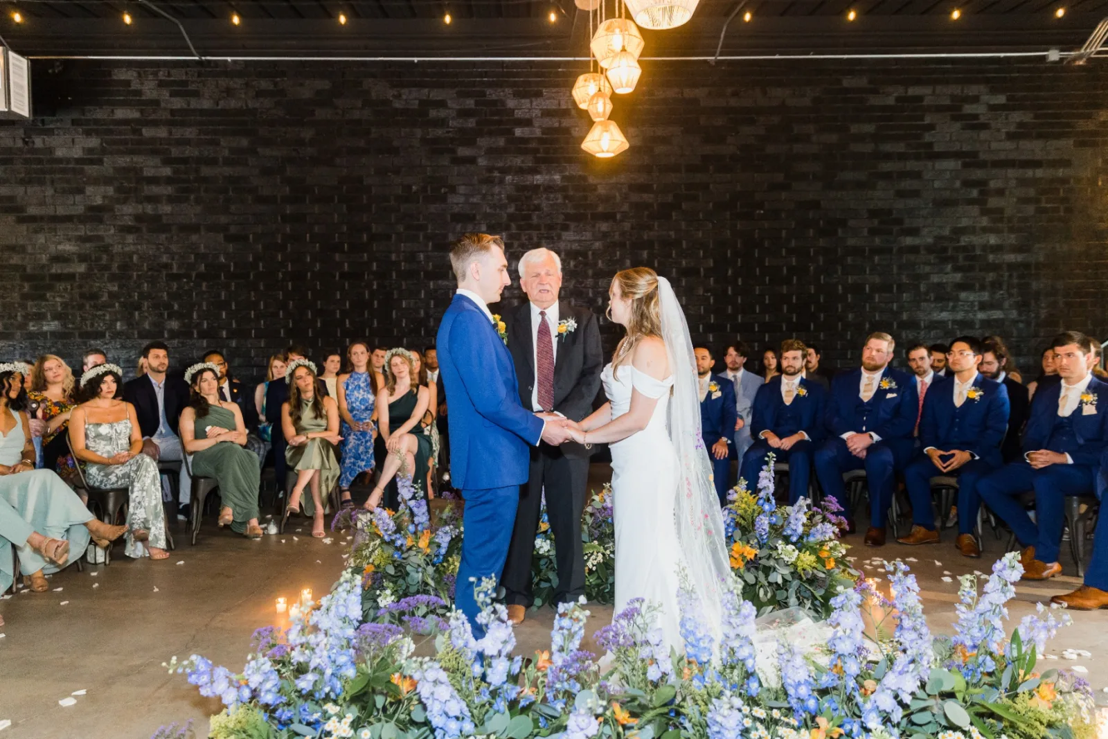 Ceremony vows surrounded by wildflowers
