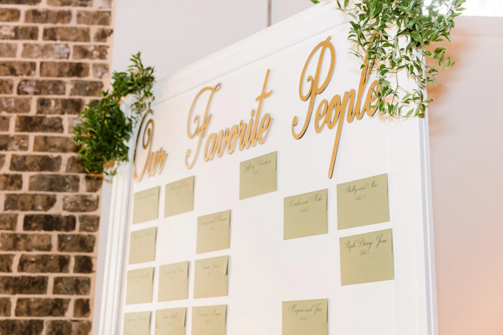 Our Favorite People seating chart with greenery