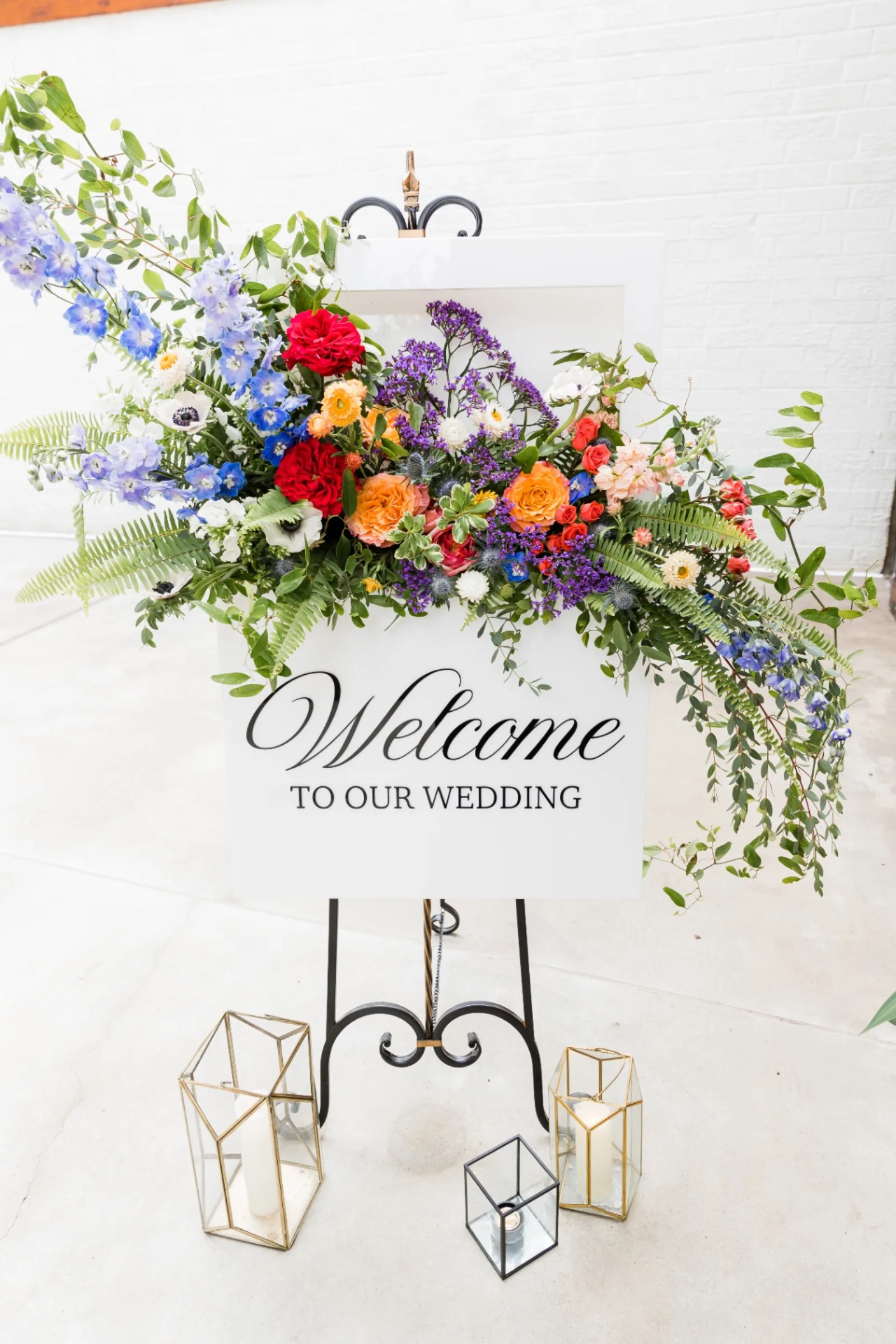 Welcome to our wedding sign with wildflower arrangement