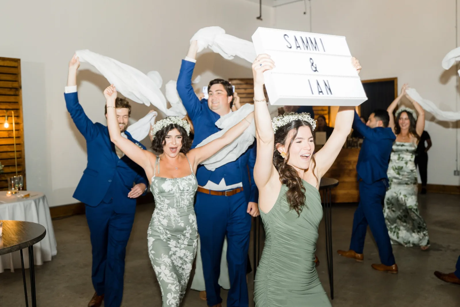 Bridesmaids cheering with Sammi and Ian lightbox